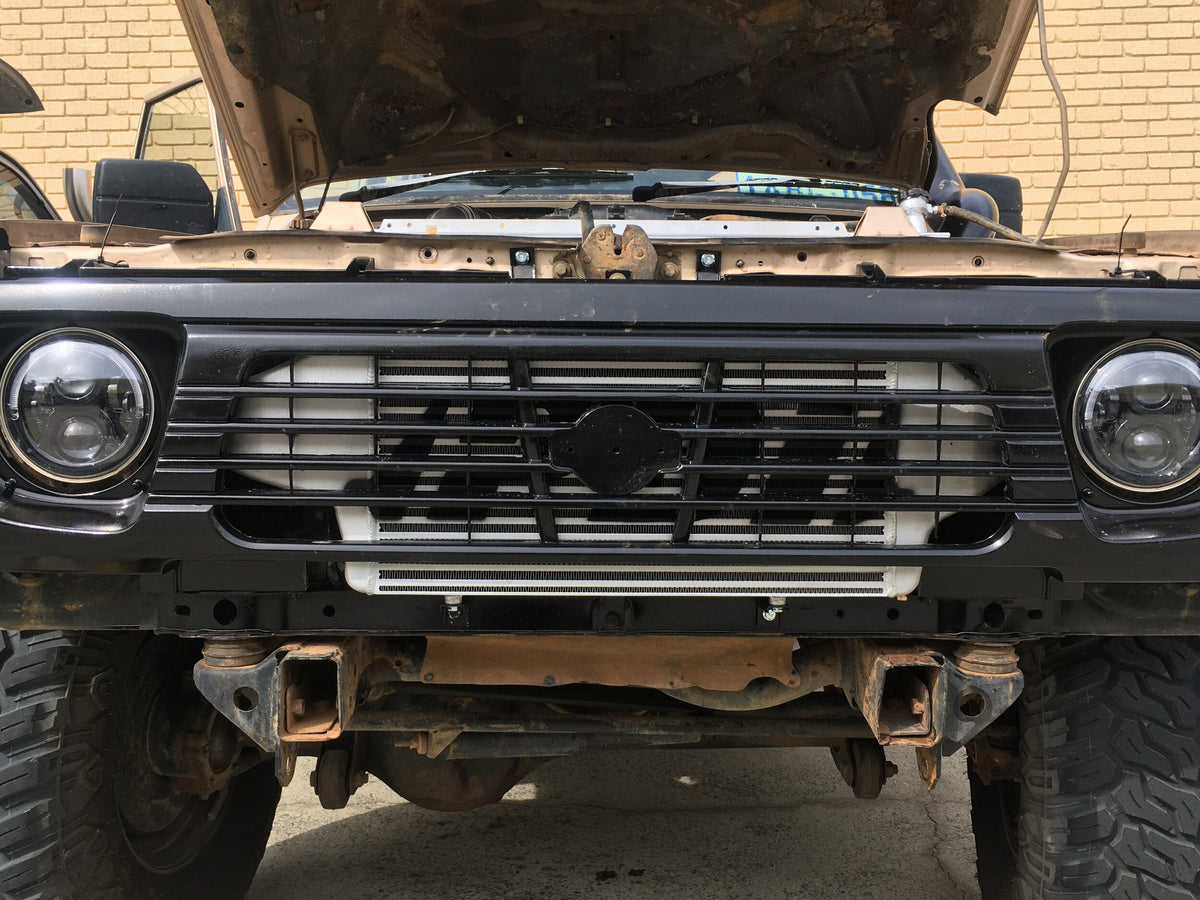 PDI front mount intercooler fitted behind the grille of a Nissan GQ Patrol