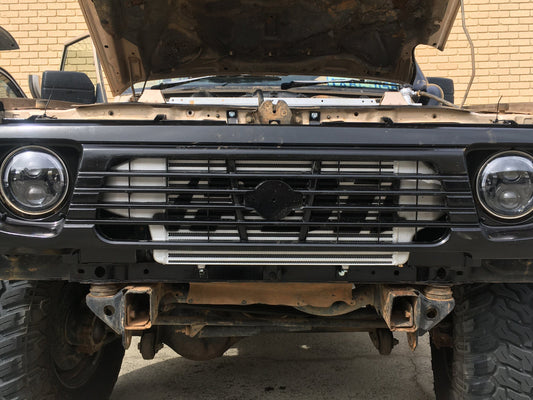 PDI front mount intercooler fitted behind the grille of a Nissan GQ Patrol